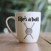 Life's a ball mug